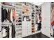 This large walk-in closet is equipped with custom shelving and storage, offering great organizational potential at 628 Chervil Valley Dr, Las Vegas, NV 89138