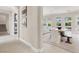 Inviting dining area next to the living room offering a modern table with bench seating at 628 Chervil Valley Dr, Las Vegas, NV 89138