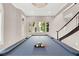 Pool table ready for a game, set in a bright room with natural light and staircase at 628 Chervil Valley Dr, Las Vegas, NV 89138