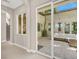 Inviting indoor/outdoor living space with sliding glass doors to a private courtyard at 628 Chervil Valley Dr, Las Vegas, NV 89138