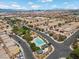 Aerial view of a community with a pool and meticulously maintained landscaping at 6729 Churnet Valley Ave, Las Vegas, NV 89139
