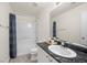 Cozy bathroom featuring a large mirror, shower and tub combo, and vanity with sink at 6729 Churnet Valley Ave, Las Vegas, NV 89139