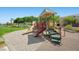 Colorful playground with slides and climbing structures on a clear sunny day at 6729 Churnet Valley Ave, Las Vegas, NV 89139