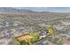 Stunning aerial view of a charming community with mountain views and horse property at 6920 Bradley Rd, Las Vegas, NV 89131