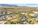 Expansive aerial view of homes with mountain backdrop in a beautiful neighborhood at 6920 Bradley Rd, Las Vegas, NV 89131