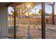 Wide shot of backyard with view to a new fence at 6920 Bradley Rd, Las Vegas, NV 89131