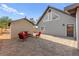 Beautiful backyard featuring a well-manicured brick patio and a lovely outdoor seating area at 6920 Bradley Rd, Las Vegas, NV 89131