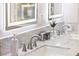 Close-up of marble countertop with dual sinks and stylish fixtures at 6920 Bradley Rd, Las Vegas, NV 89131