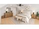 Bright bedroom featuring a neutral color palette, wood floors, and stylish decor at 6920 Bradley Rd, Las Vegas, NV 89131