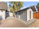 The house has charming curb appeal, highlighted by its manicured landscaping and well-lit surroundings at 6920 Bradley Rd, Las Vegas, NV 89131