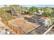 Outdoor horse arena enclosed by fencing and mature trees, ideal for equestrian activities at 6920 Bradley Rd, Las Vegas, NV 89131