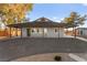Home exterior featuring a covered porch and gravel front yard at 6920 Bradley Rd, Las Vegas, NV 89131