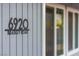 Close up of the address on the exterior of the home on a sunny day at 6920 Bradley Rd, Las Vegas, NV 89131