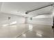 Spacious three car garage with durable epoxy flooring and ample storage space at 6920 Bradley Rd, Las Vegas, NV 89131