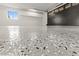 Close up of the three car garage's sealed epoxy flooring at 6920 Bradley Rd, Las Vegas, NV 89131