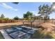 Horse property includes pipe fencing, shelters, and concrete slab at 6920 Bradley Rd, Las Vegas, NV 89131