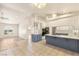 Modern kitchen layout with two islands, stainless appliances, and tiled flooring, perfect for entertaining at 7110 La Cienega St, Las Vegas, NV 89119