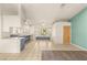 Bright living space with a large kitchen view, featuring tile floors and window seating at 7110 La Cienega St, Las Vegas, NV 89119