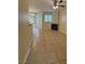 Spacious living room with tile flooring, fireplace, and sliding door at 7159 S Durango Dr # 206, Las Vegas, NV 89113