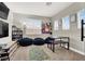 Bedroom features bean bag chairs, homework table, and ample natural light from several windows at 7310 Heggie Ave, Las Vegas, NV 89131