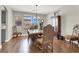 Elegant dining room featuring hardwood floors, a chandelier, and antique furniture at 7310 Heggie Ave, Las Vegas, NV 89131