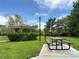 Picturesque view of a gazebo and picnic table in a park with manicured lawns at 7310 Heggie Ave, Las Vegas, NV 89131