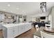 Spacious kitchen features a large island, grey cabinetry, stainless steel appliances, and open floor plan at 7310 Heggie Ave, Las Vegas, NV 89131