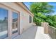 Exterior shot showing the patio and view of lush trees at 7310 Heggie Ave, Las Vegas, NV 89131