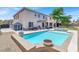 Backyard pool and patio offers a relaxing space for outdoor entertaining at 7310 Heggie Ave, Las Vegas, NV 89131