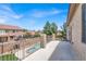 Outdoor patio overlooks the sparkling pool, perfect for relaxing and entertaining on sunny days at 7310 Heggie Ave, Las Vegas, NV 89131
