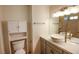 Bathroom featuring modern fixtures, wood look floors, and a clean, bright space at 7429 Fencerow St, Las Vegas, NV 89131