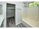 Bright bathroom featuring a tub/shower combo and access to a walk-in closet at 7429 Fencerow St, Las Vegas, NV 89131