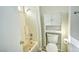 This bathroom features a tub with shower and a toilet with built in shelving at 7429 Fencerow St, Las Vegas, NV 89131