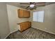Bedroom features neutral decor, ceiling fan and window letting in natural light at 7429 Fencerow St, Las Vegas, NV 89131