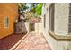 Low maintenance side yard with brick pavers and block wall at 7429 Fencerow St, Las Vegas, NV 89131
