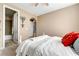 Serene bedroom with an ensuite bathroom and cozy decor at 7778 Villa Montara St, Las Vegas, NV 89123