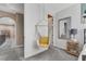 Bedroom featuring a hanging chair and a neutral color scheme at 7778 Villa Montara St, Las Vegas, NV 89123