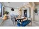 Bright dining area featuring a large table, modern decor, and archways at 7778 Villa Montara St, Las Vegas, NV 89123