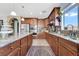 Well-appointed kitchen with a central island, stainless steel appliances, and ample counter space at 7778 Villa Montara St, Las Vegas, NV 89123