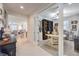 Inviting entryway with views of an office area featuring a built-in bookcase and a formal dining and living area at 8269 Skye Peak St, Las Vegas, NV 89166
