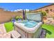 Relaxing hot tub in a well-maintained backyard with lush greenery and a serene ambiance at 8269 Skye Peak St, Las Vegas, NV 89166