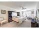 Spacious main bedroom with ample natural light, large closet, and comfortable sitting area at 8269 Skye Peak St, Las Vegas, NV 89166