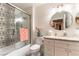 Elegant bathroom with textured walls, tiled shower, and stylish decor at 8516 Millsboro Dr, Las Vegas, NV 89134
