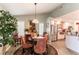 Bright dining area showcasing stylish chairs, pendant lighting, and ample natural light at 8516 Millsboro Dr, Las Vegas, NV 89134