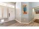 Inviting entryway featuring neutral walls and modern flooring, with a view into other rooms at 8516 Millsboro Dr, Las Vegas, NV 89134