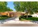 Charming one-story home with well-maintained landscaping and attached two-car garage at 8516 Millsboro Dr, Las Vegas, NV 89134
