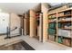 Well-organized garage featuring wall-to-wall built-in cabinets for ample storage at 8516 Millsboro Dr, Las Vegas, NV 89134