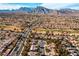 Extensive aerial view showcasing the scale of the residential community with a mountain backdrop at 8629 Prairie Hill Dr, Las Vegas, NV 89134