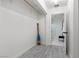 Extra closet space with an oar, leading into a bathroom with glass shower door at 8629 Prairie Hill Dr, Las Vegas, NV 89134