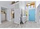 Inviting entryway with wood-look floors, coastal decor, and plenty of natural light, offering a cheerful welcome at 8629 Prairie Hill Dr, Las Vegas, NV 89134